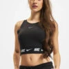 Nike Damen Tank Tops Crop Tape In Schwarz